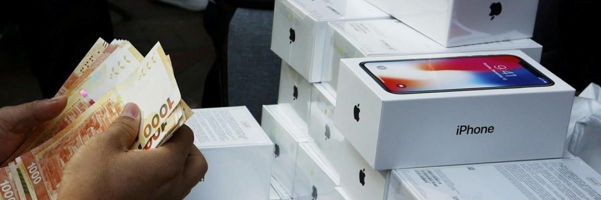 Dùng 10,000 iPhone và iPad giả để lừa Apple 6 triệu USD