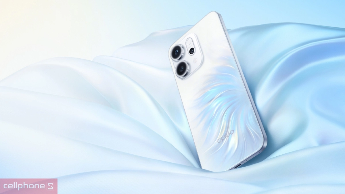 Thiết kế OPPO Reno14 phẳng thời thượng, mang lại cảm giác cầm nắm chắc chắn và mặt lưng kính ở phiên bản Trắng với hiệu ứng ánh sáng loang nhẹ như “đuôi cá”